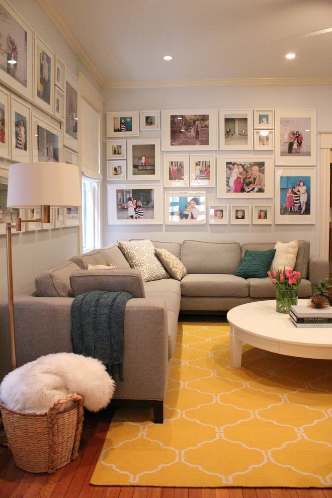 Living room - transitional medium tone wood floor living room idea in Richmond with gray walls
