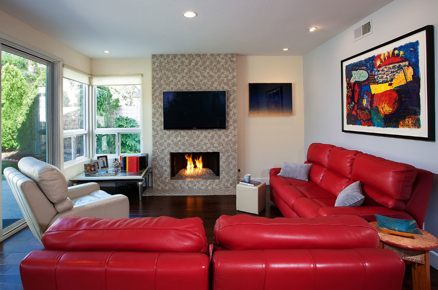 Mid-sized trendy formal and enclosed dark wood floor living room photo in Los Angeles with white walls, a standard fireplace, a tile fireplace and a wall-mounted tv