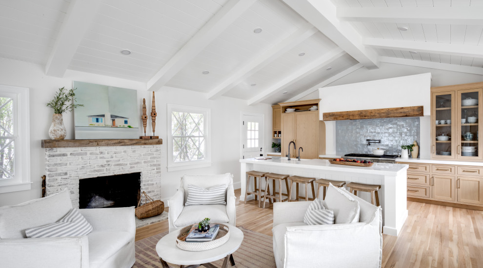 Inspiration for a small beach style living room in Orange County with a vaulted ceiling.