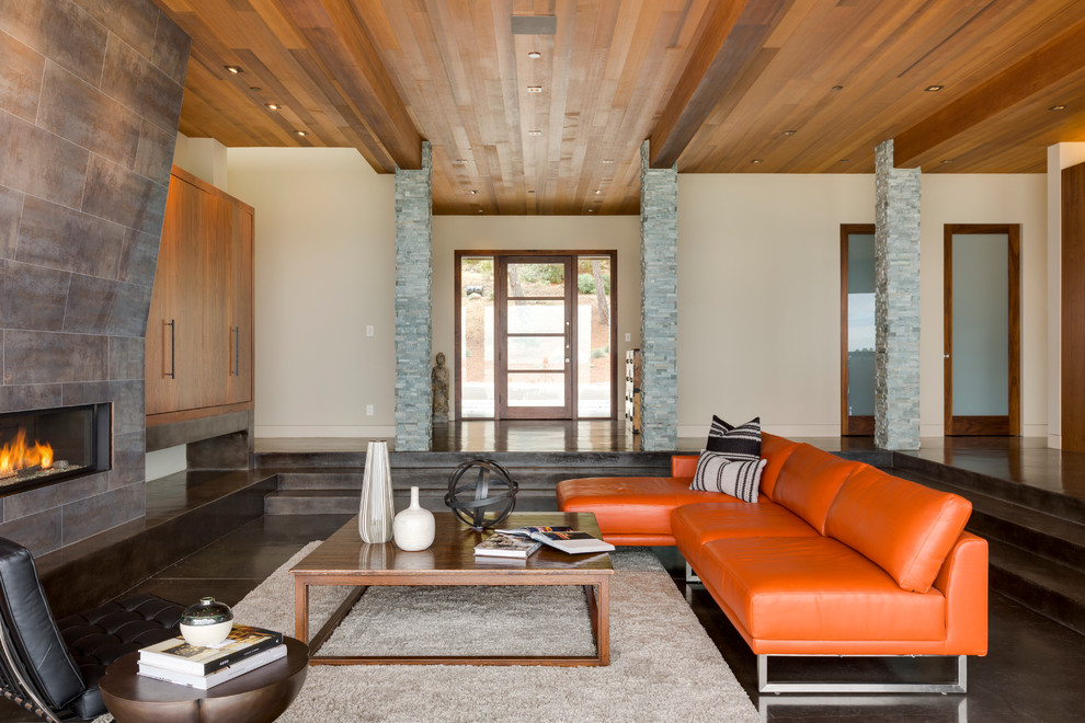 Trendy open concept concrete floor living room photo in San Francisco with beige walls, a ribbon fireplace and a tile fireplace