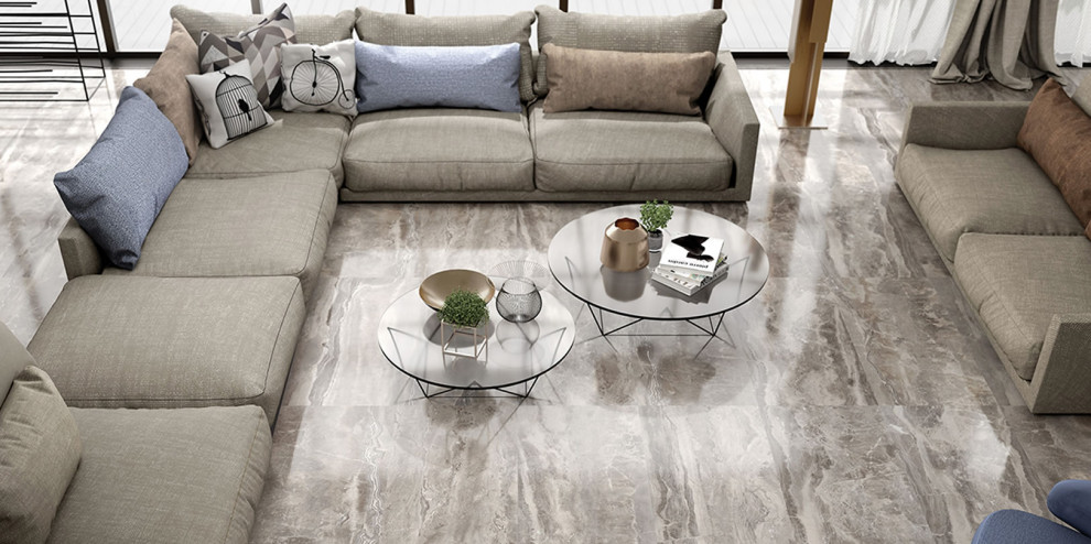 Ispirazione per un soggiorno design aperto con pavimento in gres porcellanato e pavimento grigio