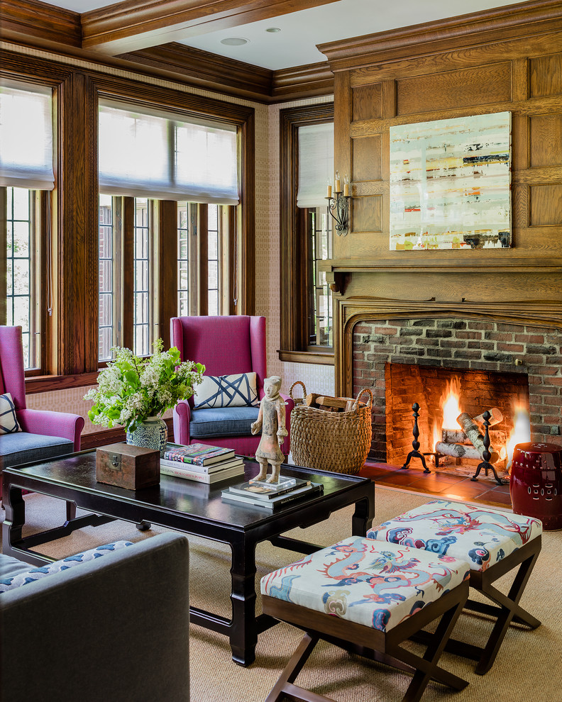 Large traditional living room in Boston with beige walls, a standard fireplace and a brick fireplace surround.