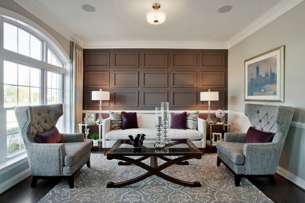 Photo of a classic enclosed living room in Chicago with beige walls and dark hardwood flooring.