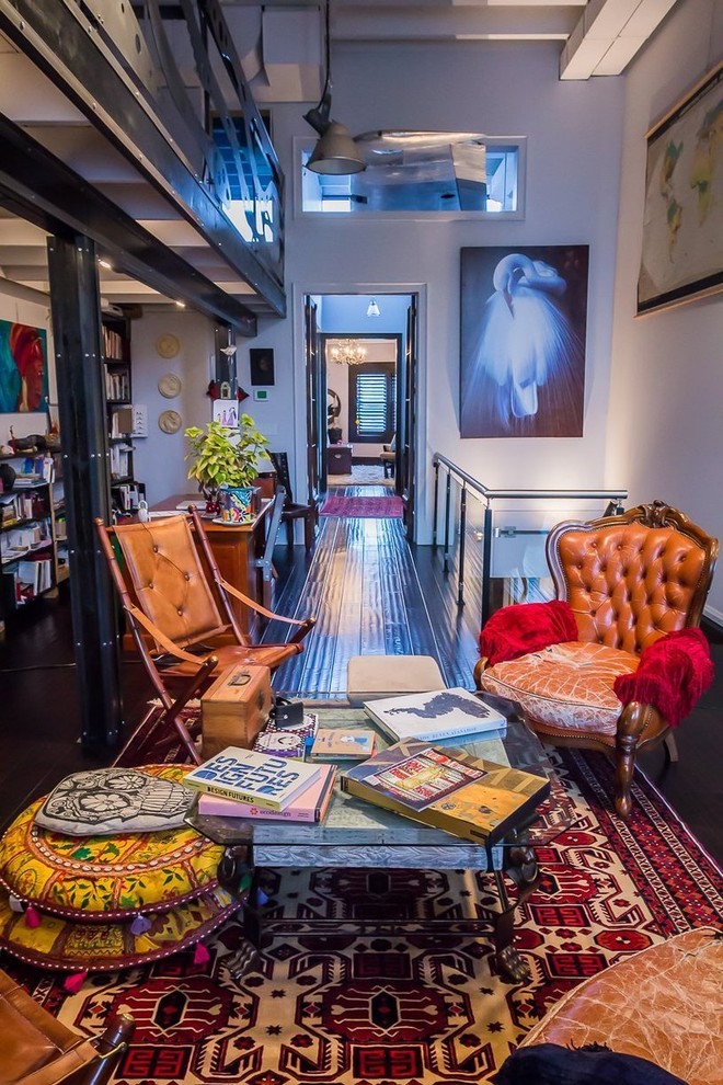 Living room - small eclectic loft-style living room idea in Toronto with white walls, no fireplace and no tv
