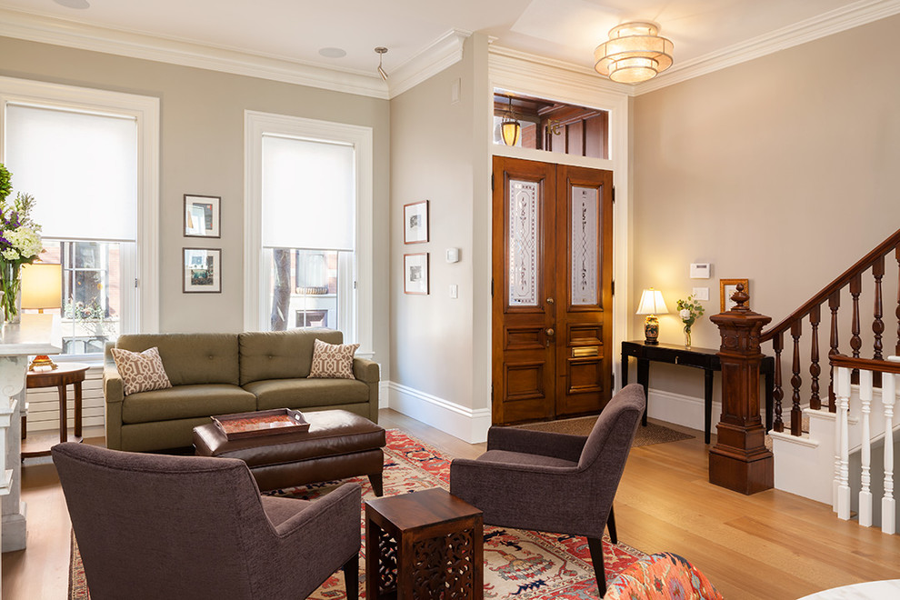 Elegant open concept living room photo in Boston