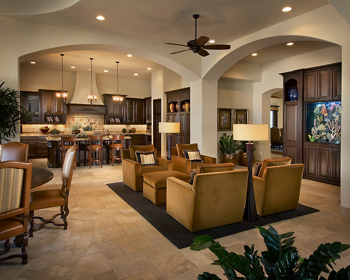 Example of a mid-sized classic formal and open concept travertine floor living room design in Phoenix with beige walls, no fireplace and no tv