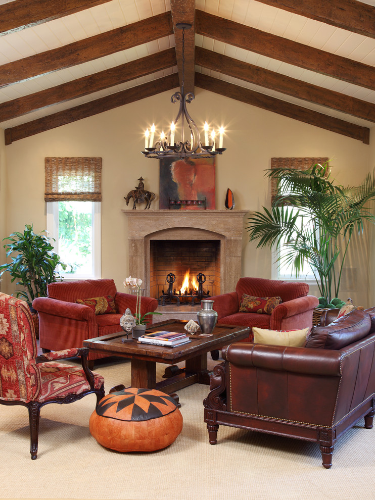 This is an example of a traditional formal living room in San Francisco with beige walls, carpet, a standard fireplace and a stone fireplace surround.