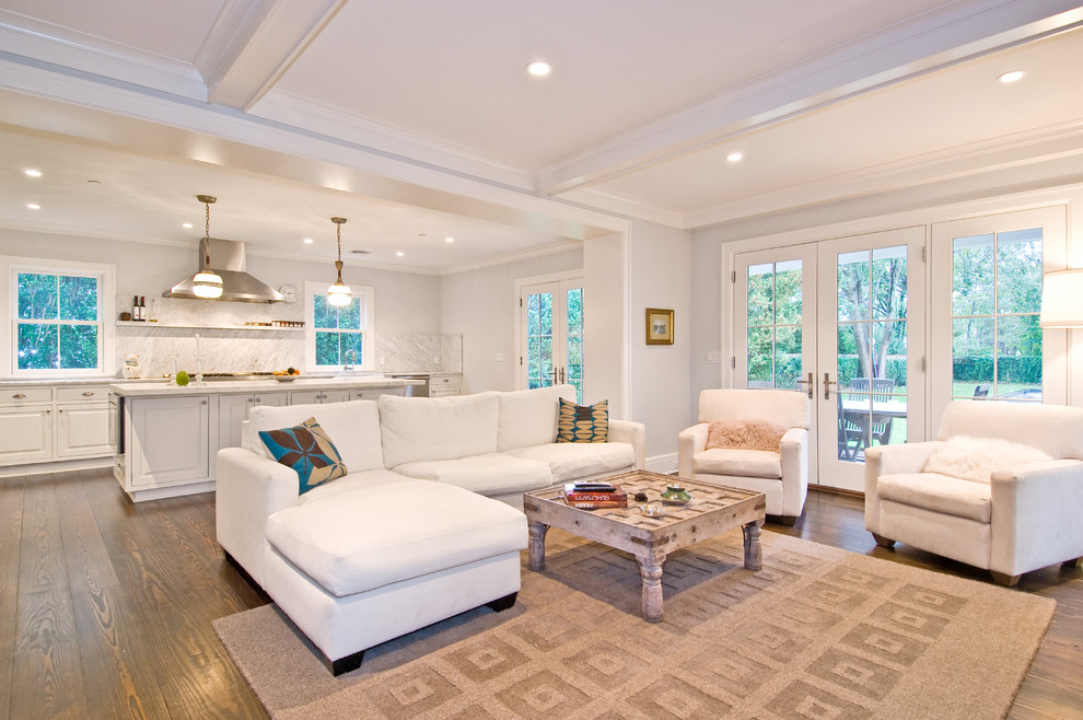 Inspiration for a timeless open concept dark wood floor living room remodel in New York with gray walls