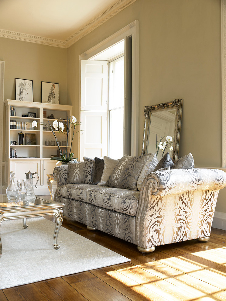 Inspiration for a classic living room in Hertfordshire with beige walls and light hardwood flooring.