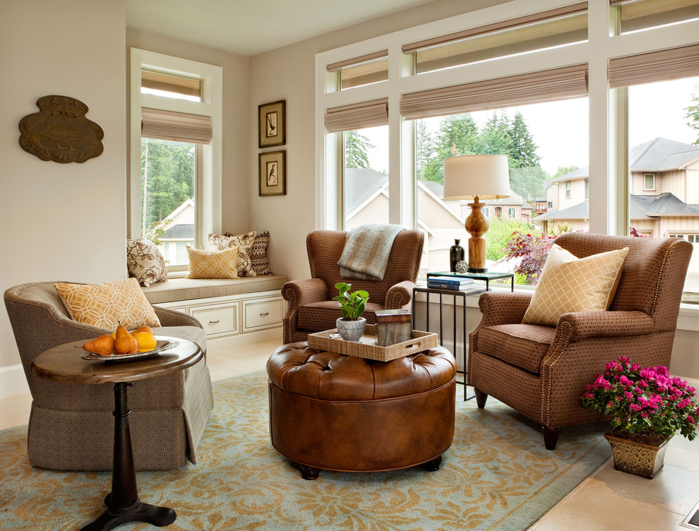 This is an example of a small traditional living room in Portland with beige walls and feature lighting.