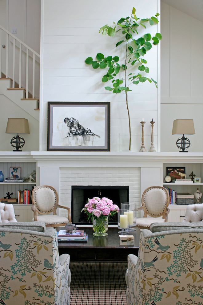 Living room - traditional living room idea in Other with white walls