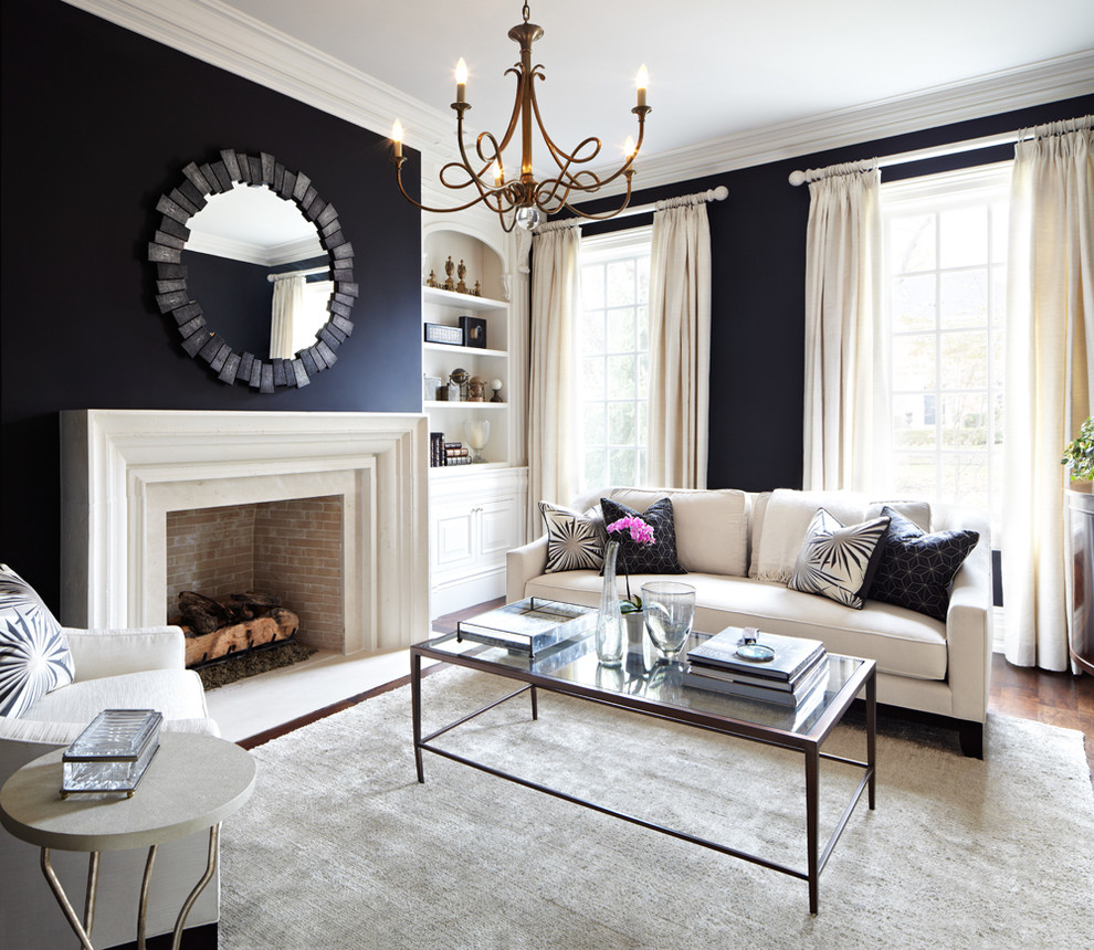 Living room - traditional formal and enclosed living room idea in Dallas with black walls, a standard fireplace and no tv