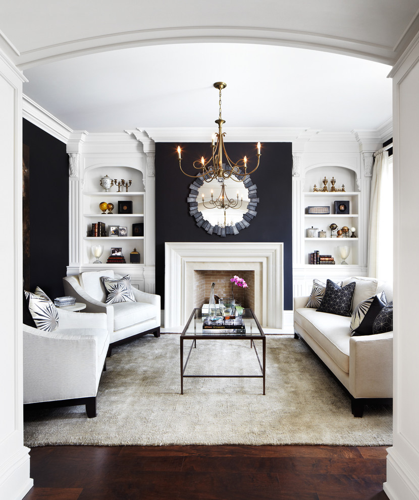 Elegant formal and enclosed dark wood floor living room photo in Dallas with black walls, a standard fireplace and no tv