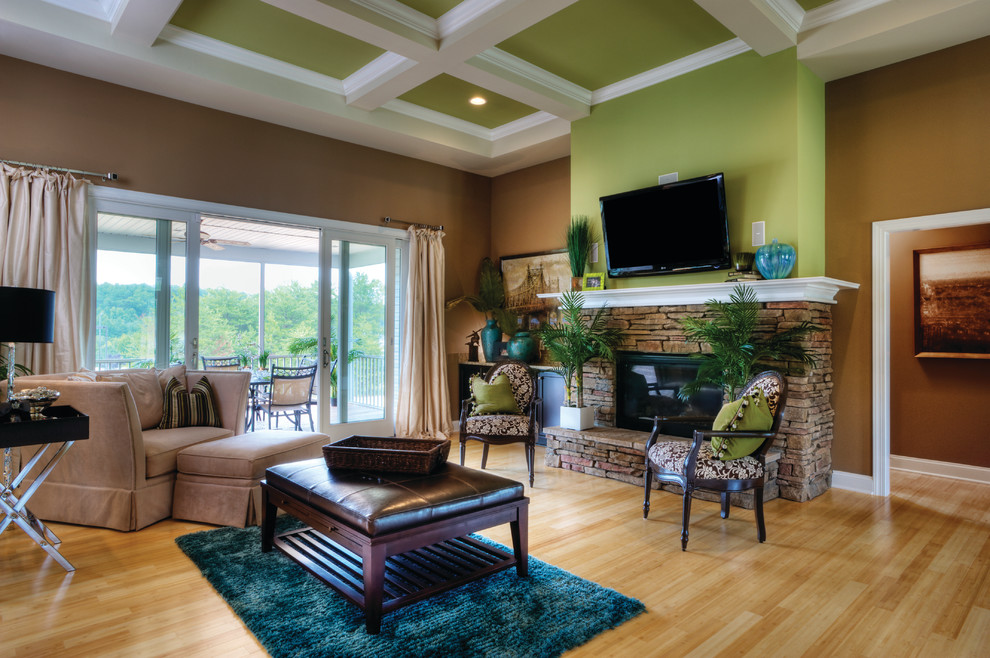 Living room - traditional living room idea in Cleveland with a stone fireplace