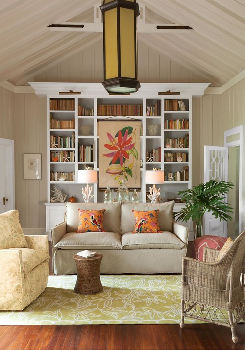 traditional living room library with beige walls