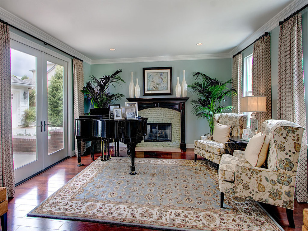 Example of a classic living room design in Other with a tile fireplace