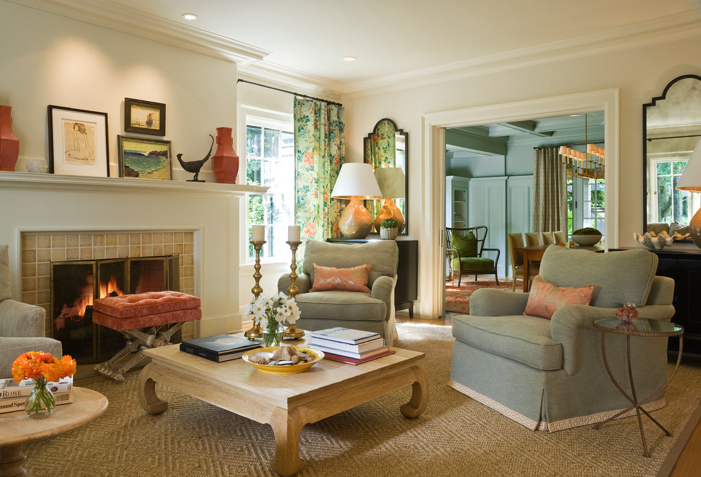 Example of a classic formal and enclosed medium tone wood floor living room design in Portland with beige walls, a standard fireplace and a tile fireplace