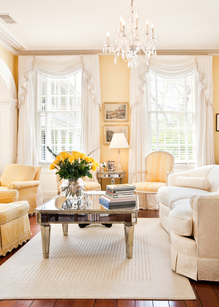Inspiration for a victorian formal living room in Charleston with yellow walls.
