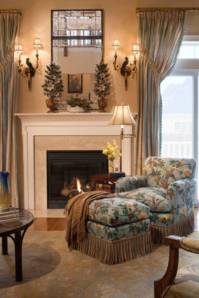 Inspiration for a medium sized traditional formal enclosed living room in New York with beige walls, dark hardwood flooring, a standard fireplace and a brick fireplace surround.