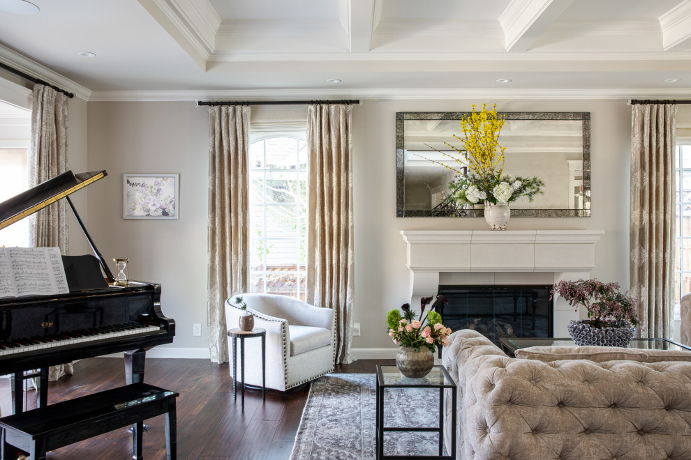 Inspiration for a timeless dark wood floor, brown floor and tray ceiling living room remodel in San Francisco with beige walls and a standard fireplace