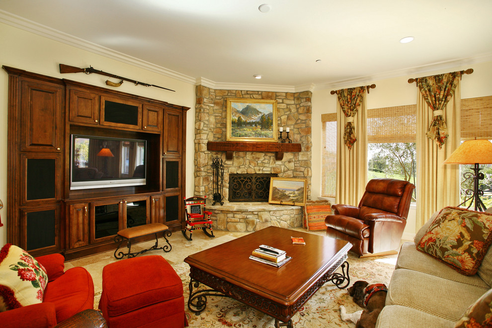 Example of a mid-sized classic open concept marble floor living room design in San Diego with white walls, a corner fireplace, a stone fireplace and a media wall