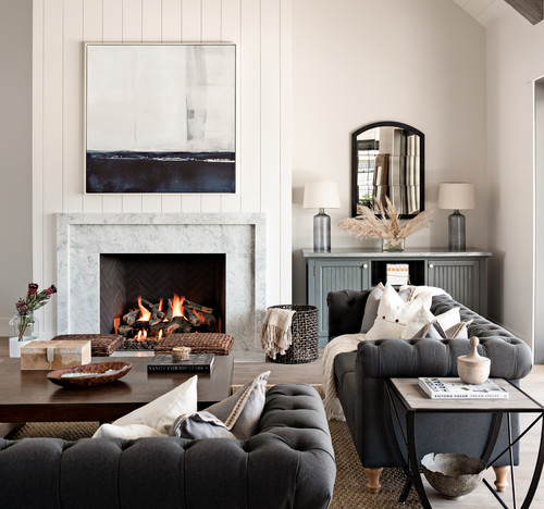 Inspiration for a farmhouse light wood floor and beige floor living room remodel in Phoenix with white walls and a standard fireplace