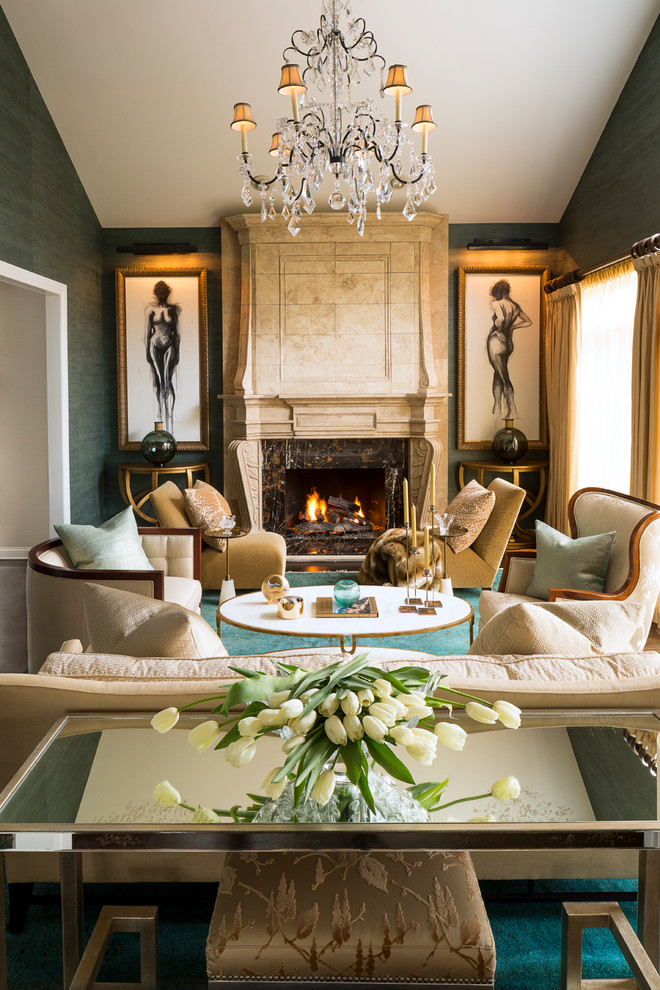 This is an example of a classic formal living room in Chicago with green walls and a standard fireplace.
