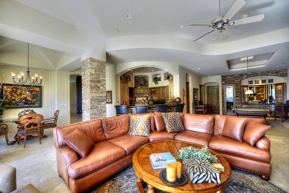 Inspiration for an expansive traditional formal open plan living room in Phoenix with a stone fireplace surround.