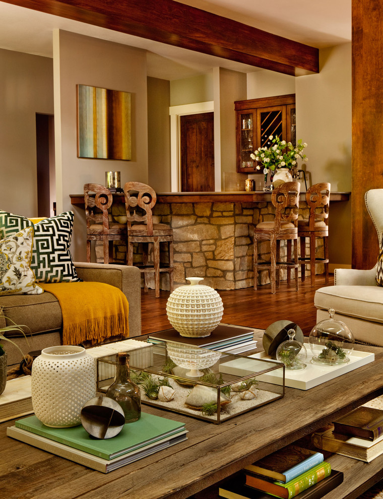 Transitional living room photo in Portland with a bar and beige walls