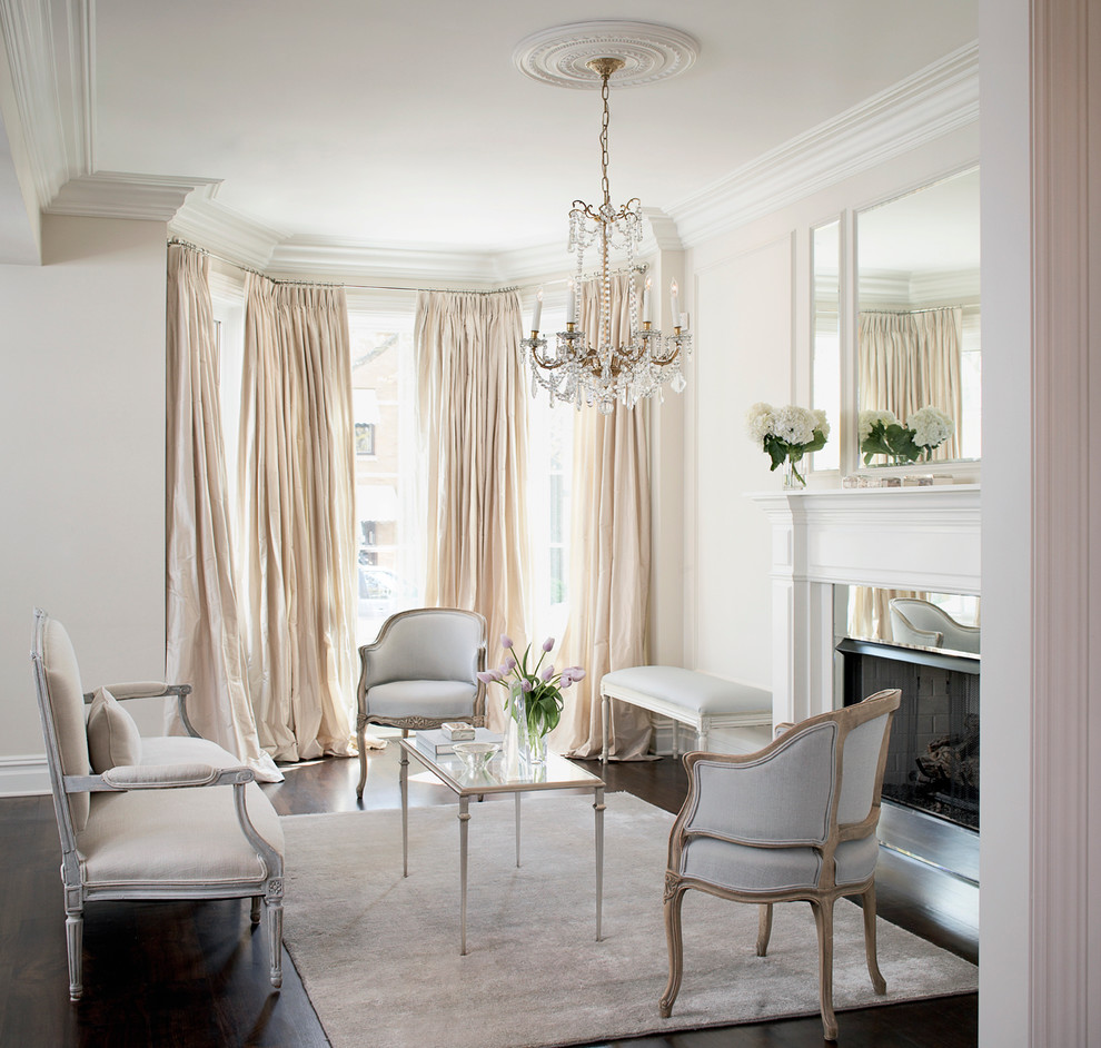 Example of a transitional formal and enclosed dark wood floor living room design in Chicago with white walls, a standard fireplace, a metal fireplace and no tv