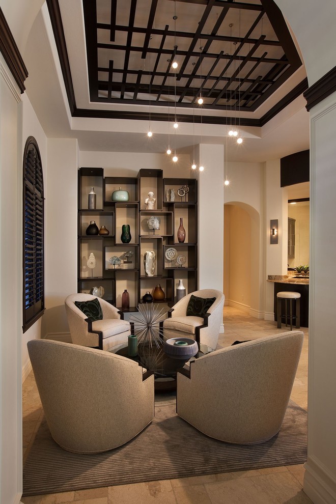 Mid-sized transitional formal and open concept limestone floor living room photo in Miami with no fireplace