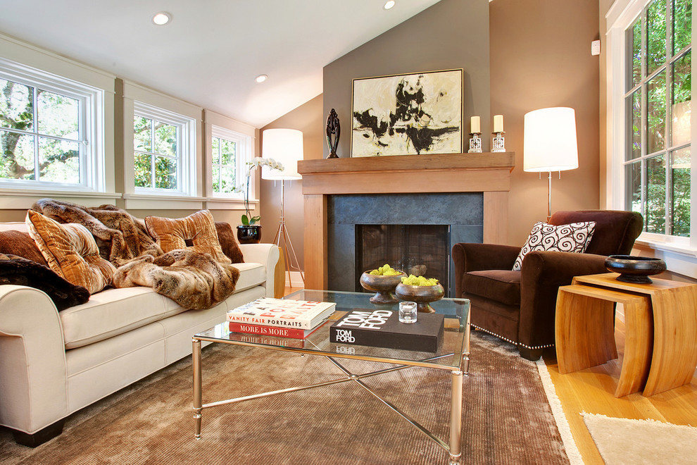 Living room - transitional enclosed living room idea in San Francisco with beige walls and a standard fireplace