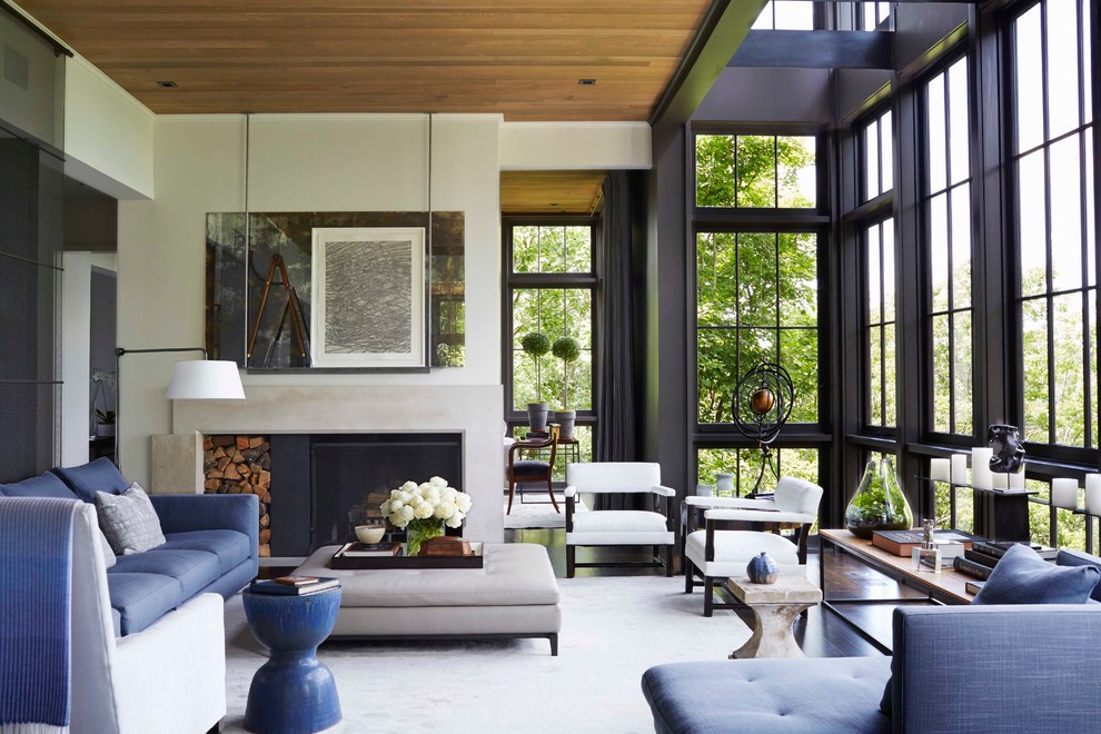 Inspiration for a contemporary open plan living room in Nashville with white walls and a standard fireplace.