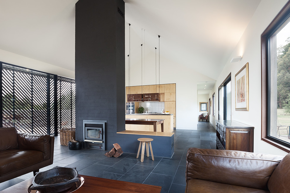Inspiration for a contemporary living room in Geelong with white walls and a standard fireplace.