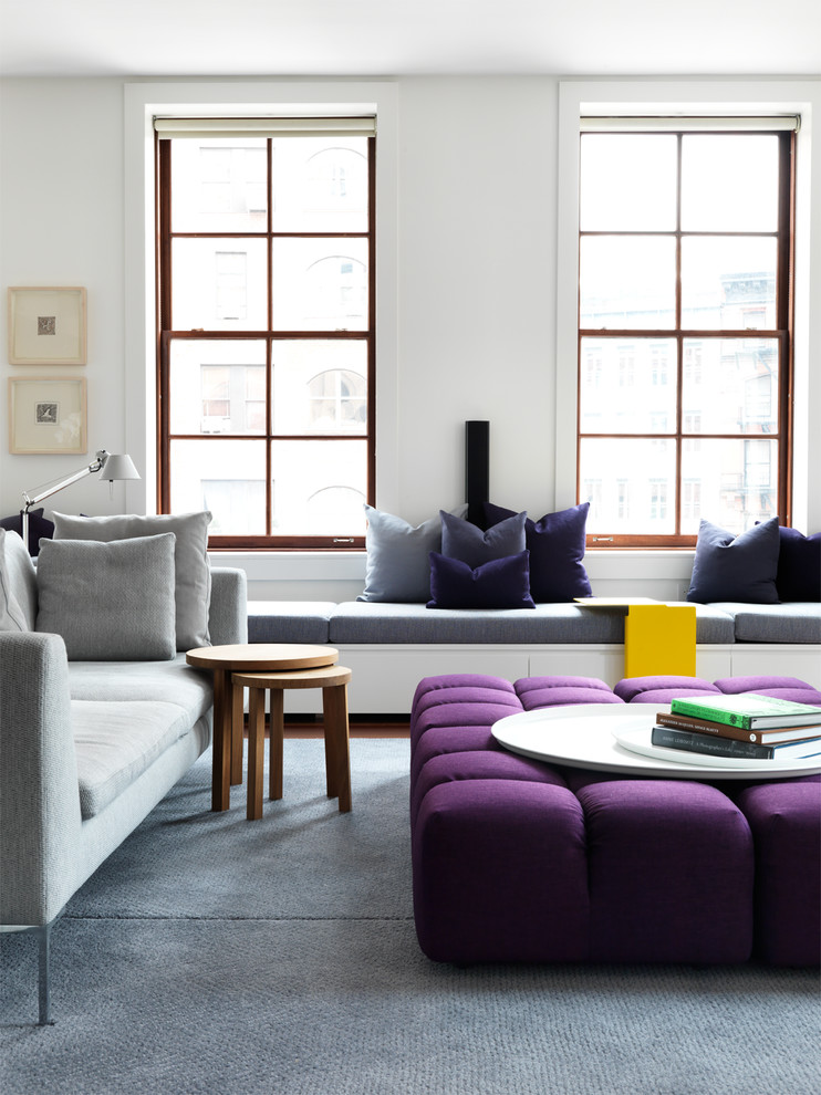 Example of a large trendy living room design in New York with white walls