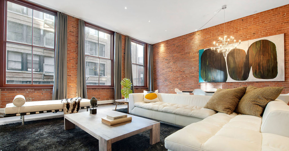 Industrial Wohnzimmer im Loft-Stil mit Betonboden in New York