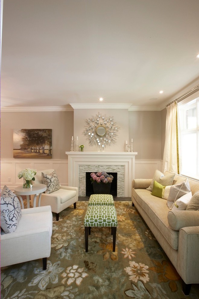 Example of a transitional living room design in Toronto with a tile fireplace