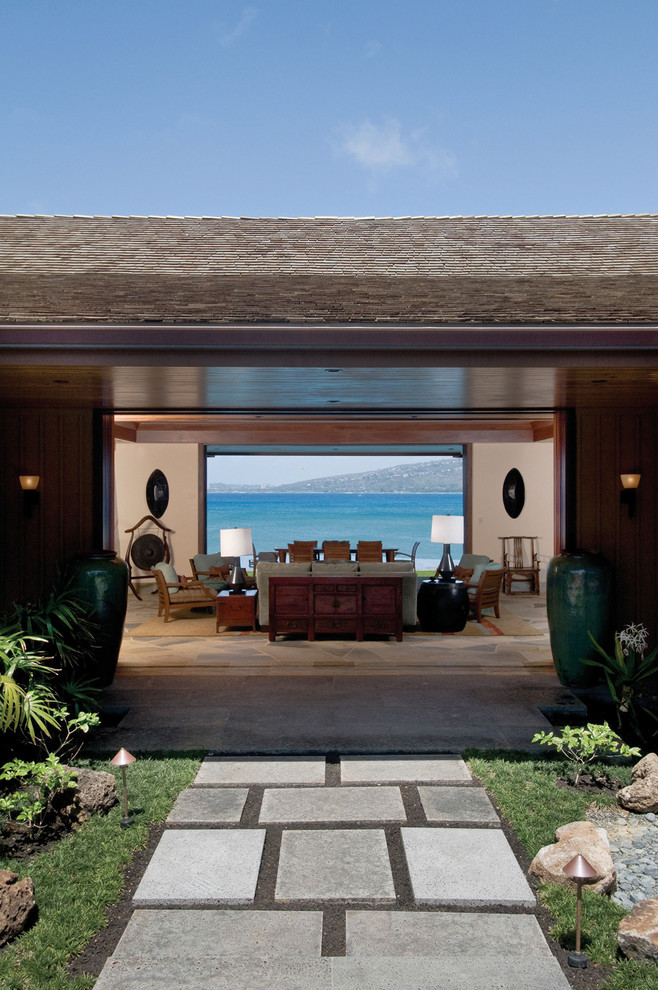 Inspiration for a huge tropical open concept living room remodel in Hawaii