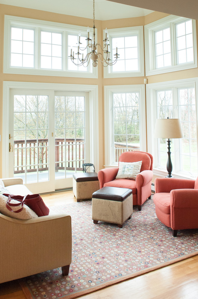 Example of a classic living room design in Portland Maine