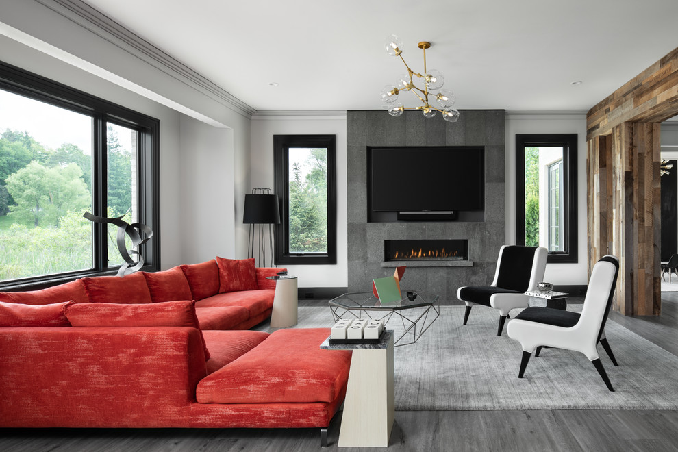 Living room - transitional gray floor living room idea in Detroit with gray walls, a ribbon fireplace, a tile fireplace and a wall-mounted tv