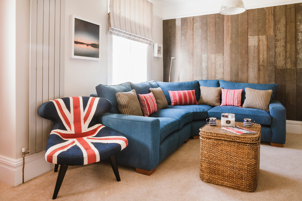 Photo of a medium sized coastal living room in Hampshire with multi-coloured walls, carpet and a wall mounted tv.