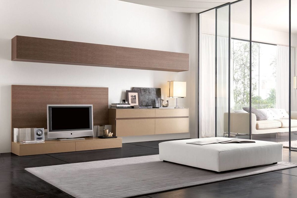 Diseño de salón abierto moderno grande sin chimenea con paredes blancas, suelo de cemento, televisor independiente y suelo gris