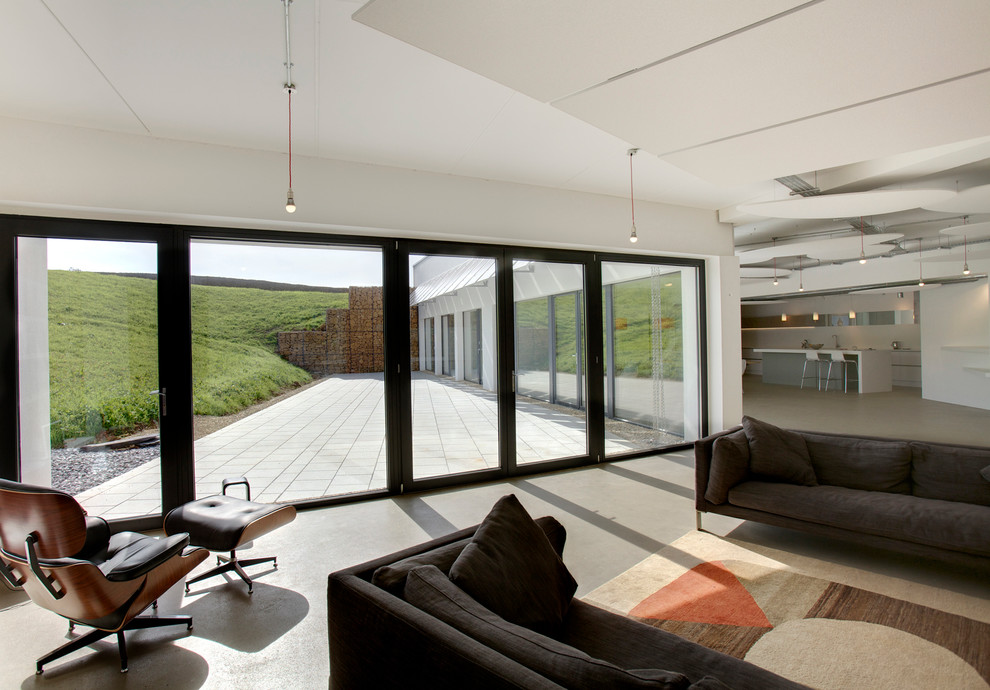 This is an example of a contemporary living room in Gloucestershire.
