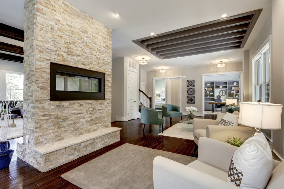 Living room - mid-sized transitional formal and open concept dark wood floor living room idea in DC Metro with beige walls, a two-sided fireplace, a stone fireplace and no tv