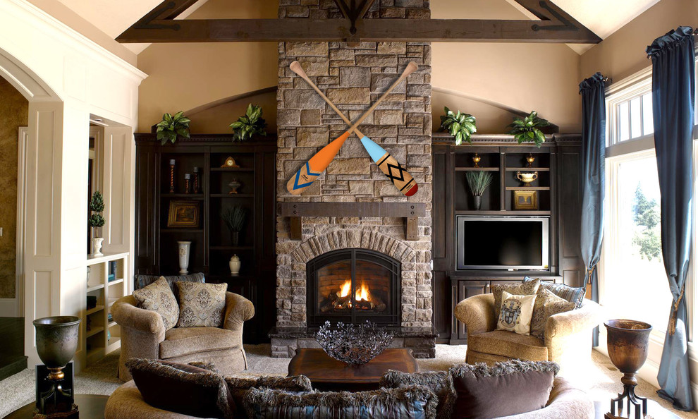 Living room photo in New York with a stone fireplace