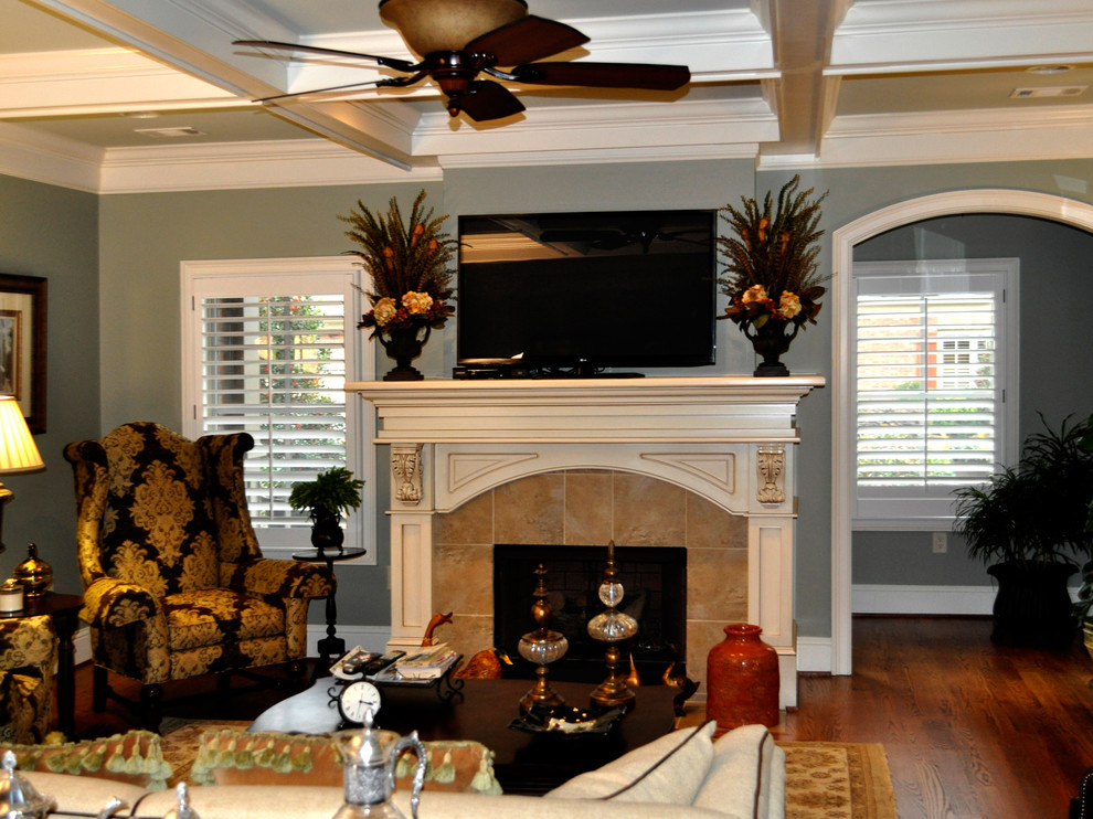 Living room - large traditional formal and enclosed dark wood floor and brown floor living room idea in Atlanta with green walls, a standard fireplace, no tv and a tile fireplace