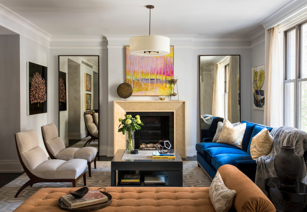 Example of a mid-sized transitional formal and enclosed dark wood floor and brown floor living room design in New York with gray walls, a standard fireplace, a tile fireplace and no tv
