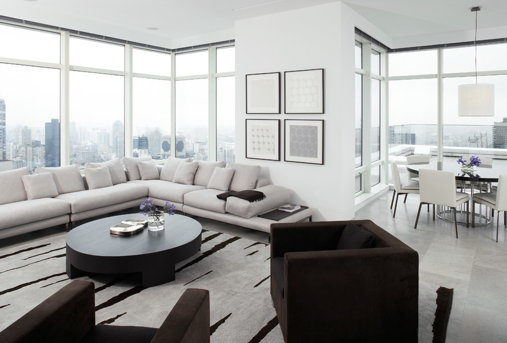 Large contemporary living room in New York with white walls.