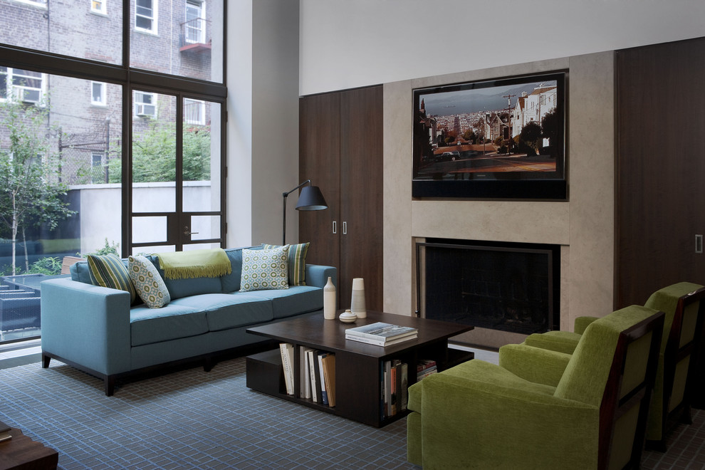 Trendy living room photo in New York with a media wall