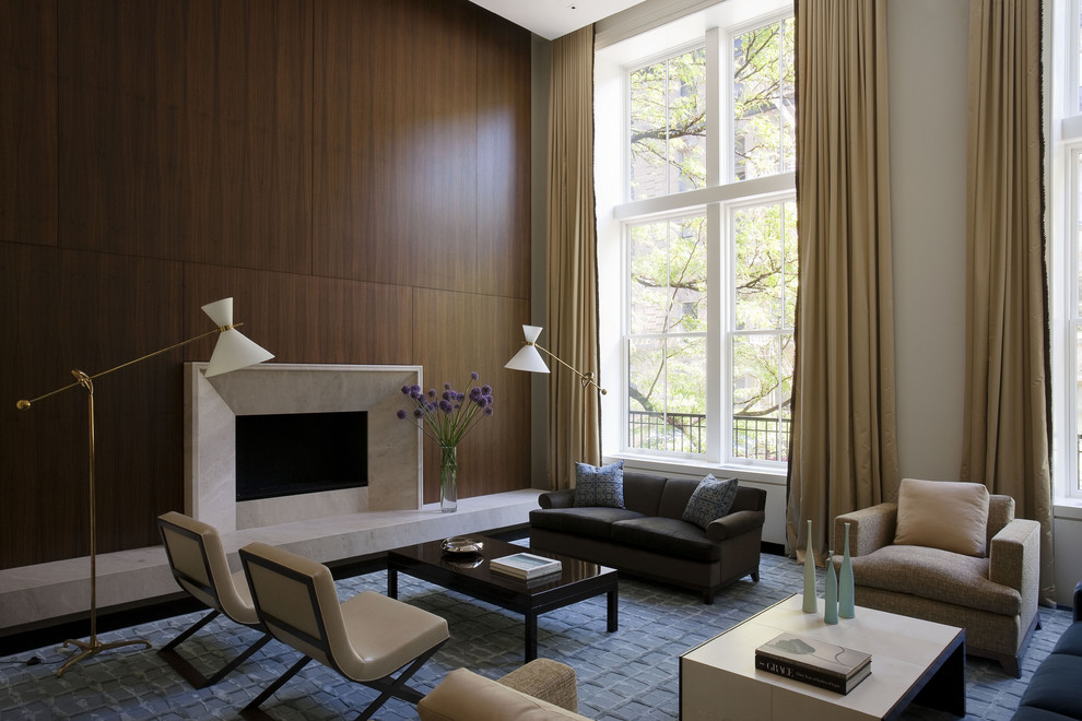 Trendy living room photo in New York with a standard fireplace and no tv